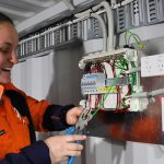 Female-Industrial-electrician-in-Melbourne-works-on-The-Victorian-Container-deposit-shceme-from-Teoma-Group.