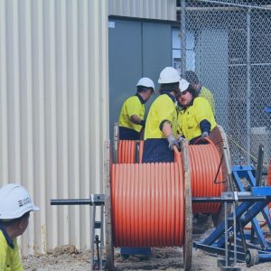 Cable_hauling_servicing_victoria_tomagroup Cable entering a pit - Cable Hauling in Melbourne delivered by Teoma group
